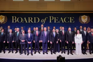 FILE – President Donald Trump stands with other World leaders before a Board of Peace meeting at the U.S. Institute of Peace, Feb. 19, 2026, in Washington. (AP Photo/Mark Schiefelbein, File) FILE – President Donald Trump stands with other World leaders before a Board of Peace meeting at the U.S. Institute of Peace, Feb. 19, 2026, in Washington. (AP Photo/Mark Schiefelbein, File)