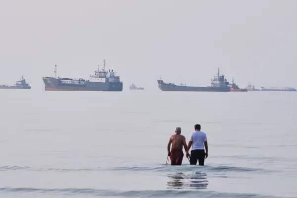 Two men wade in the waters of the Strait of Hormuz with vessels anchored in the background, off Bandar Abbas, Iran, Sunday, July 12, 2026. (Razieh Poudat/ISNA via AP) 



Associated Press / LaPresse
Only italy and spain