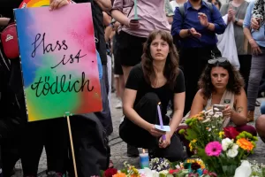 People gather outside the Brandenburg Gate for a demonstration in support of LGBTQ+ after a car rammed into a crowd at the Pride March in Berlin, Sunday, July 26, 2026. (AP Photo/Ebrahim Noroozi) People gather outside the Brandenburg Gate for a demonstration in support of LGBTQ+ after a car rammed into a crowd at the Pride March in Berlin, Sunday, July 26, 2026. (AP Photo/Ebrahim Noroozi)