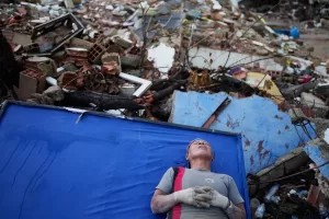 Resident Kerli Faria takes a break amid the rubble while searching for her nephews at a building that collapsed during the earthquakes that struck La Guaira, Venezuela, Tuesday, June 30, 2026. (AP Photo/Ariana Cubillos) Resident Kerli Faria takes a break amid the rubble while searching for her nephews at a building that collapsed during the earthquakes that struck La Guaira, Venezuela, Tuesday, June 30, 2026. (AP Photo/Ariana Cubillos)