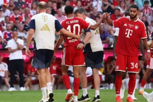 Munich’s Jamal Musiala, center, leaves the pitch due to an injury during a pre-season soccer match between FC Bayern Munich and RB Leipzig in Munich, Germany, Saturday, Aug. 15, 2026. (Karl-Josef Hildenbrand/dpa via AP) Munich’s Jamal Musiala, center, leaves the pitch due to an injury during a pre-season soccer match between FC Bayern Munich and RB Leipzig in Munich, Germany, Saturday, Aug. 15, 2026. (Karl-Josef Hildenbrand/dpa via AP)