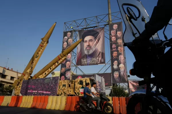 Motorbikes drive past Iranian missiles and banners showing portraits of the Iranian Supreme Leader Ayatollah Mojtaba Khamenei, center, and the late armed forces commanders and nuclear scientists, who were killed in Israeli and U.S. strikes, displayed in a military exhibition commemorating the anniversary of the start of the 1980-88 Iraq-Iran war at Baharestan Square, in Tehran, Monday, Sept. 28, 2026. (AP Photo/Vahid Salemi) Motorbikes drive past Iranian missiles and banners showing portraits of the Iranian Supreme Leader Ayatollah Mojtaba Khamenei, center, and the late armed forces commanders and nuclear scientists, who were killed in Israeli and U.S. strikes, displayed in a military exhibition commemorating the anniversary of the start of the 1980-88 Iraq-Iran war at Baharestan Square, in Tehran, Monday, Sept. 28, 2026. (AP Photo/Vahid Salemi)