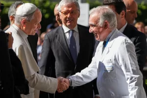 Medical Director Andrea Cambieri, right, receives Pope Leo XIV as he arrives at the Agostino Gemelli Polyclinic in Rome, Tuesday, Oct. 13, 2026, where he’s expected to be operated to remove a lung nodule. (AP Photo/Gregorio Borgia)